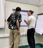 Zetao Xu presents his poster at CreteLing Summer School